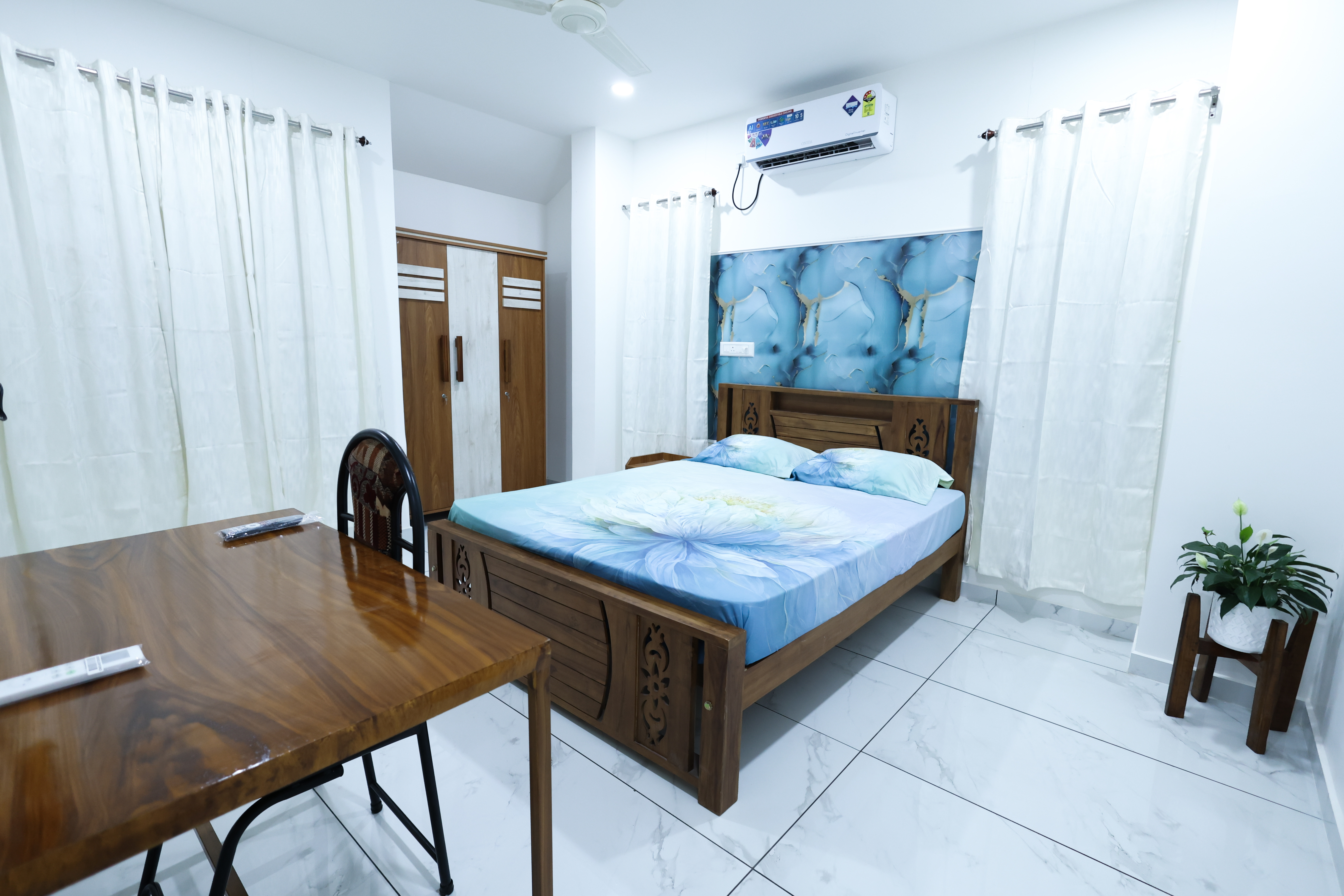 Bright Nest Munroe comfortable guest room with modern furnishings